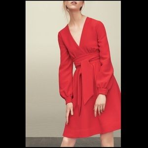 A long sleeve Kate spade dress.