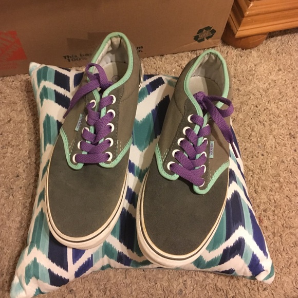 Grey Vans with teal accents
