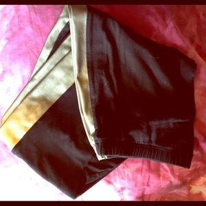 TORRID size 3 -gold stripped leggings. WORN TWICE