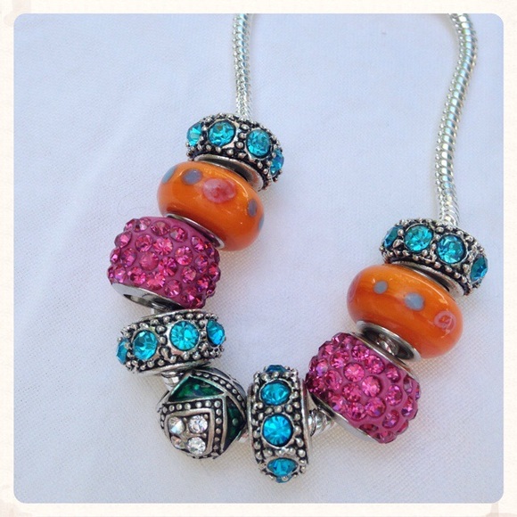 Swarovski Jewelry - Stunning Charms on a Snake chain Bracelet