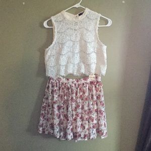 Floral skirt and lace crop top.