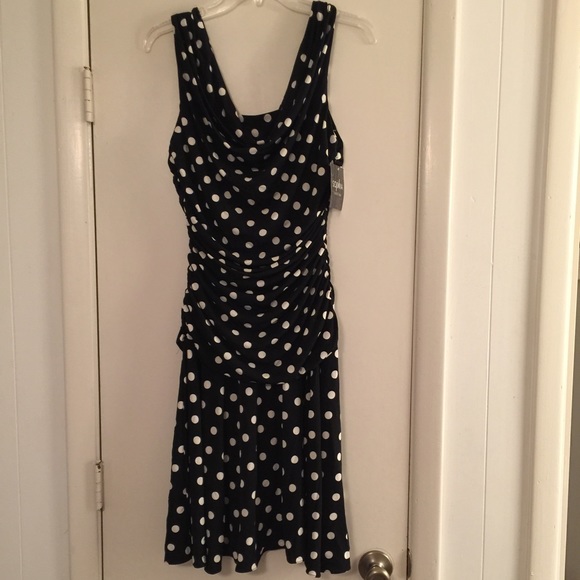 Black and white polka dot ruched dress.