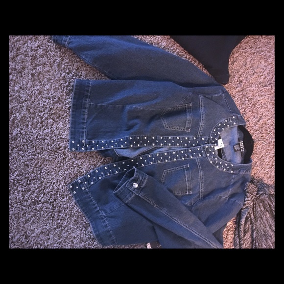 Dark Denim jacket with studs.