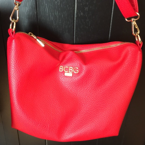 Bright Red shoulder bag with adjustable strap.