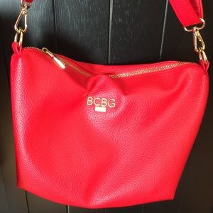 Bright Red shoulder bag with adjustable strap.