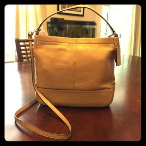 Compact leather Coach purse (New)