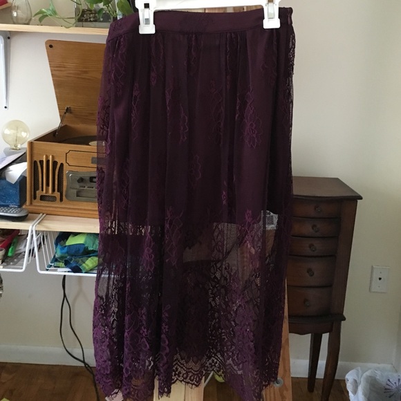Plum colored skirt knee length with lace trim!