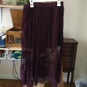 Plum colored skirt knee length with lace trim!