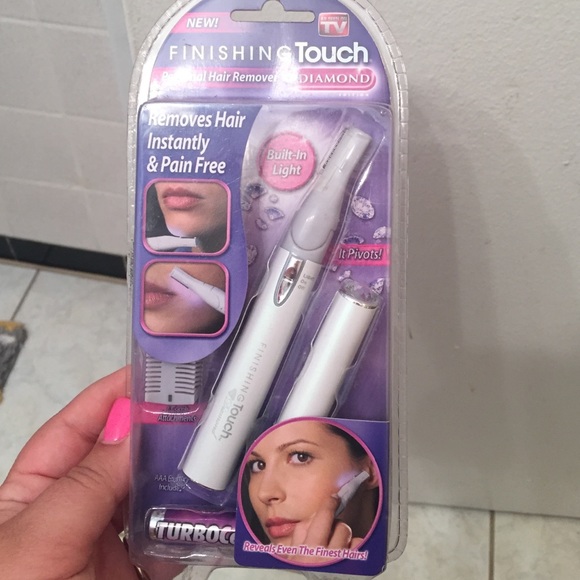 Finishing Touch personal hair remover