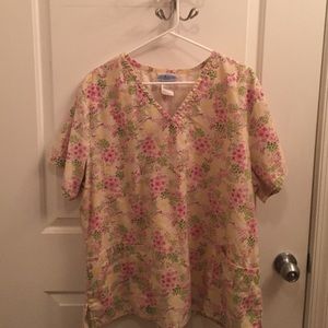 Flowered cover scrub top