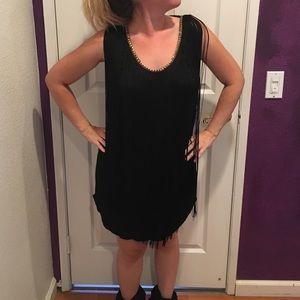 Black tasseled dress.