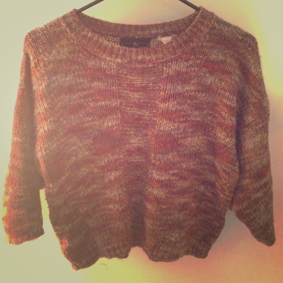 Cropped wool sweater.