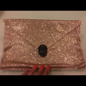 Rose gold sequin clutch