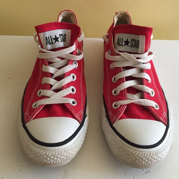 Red low-top Converse sneakers
