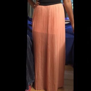 Pleated soft peach colored high waisted maxi skirt