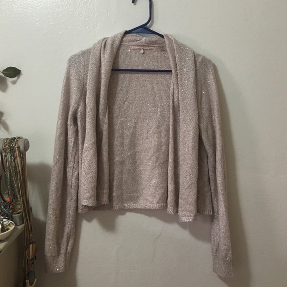 Soft pink cardigan sweater with sparkle detail