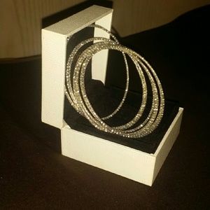 Set of 10 sterling Bangles.