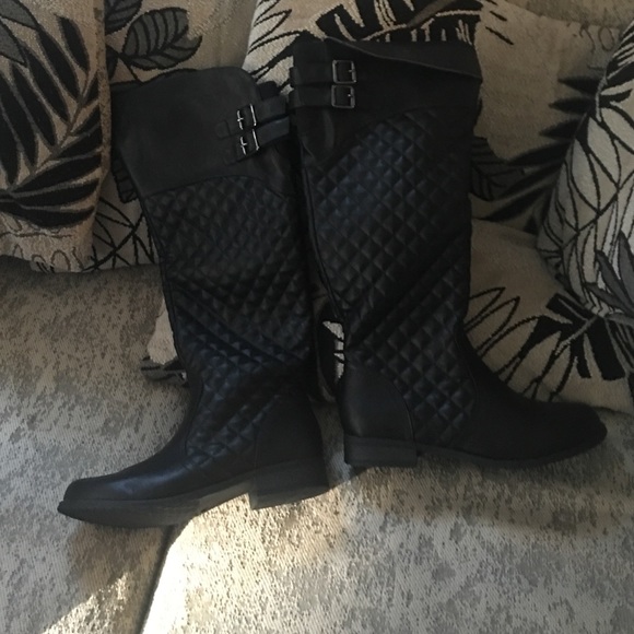 Woman's riding boots.