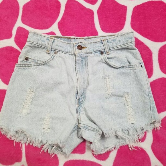 High waisted light wash destroyed Levis