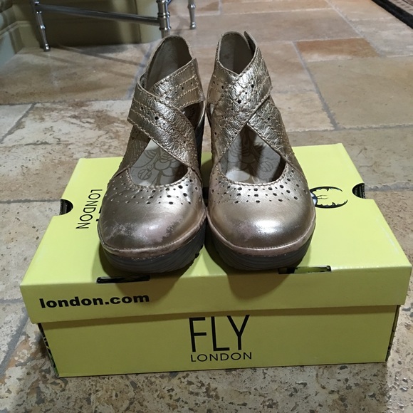 New in Box Fly London Gold Leather Platforms