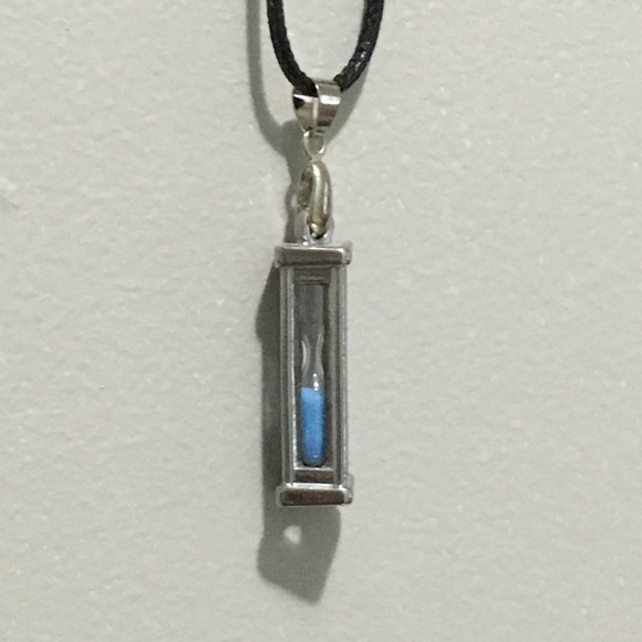 Hourglass necklace with blue sand
