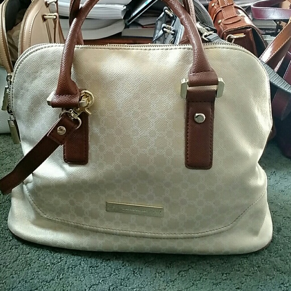 Ivanka Trump  tan gold handbag