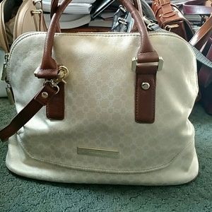 Ivanka Trump  tan gold handbag