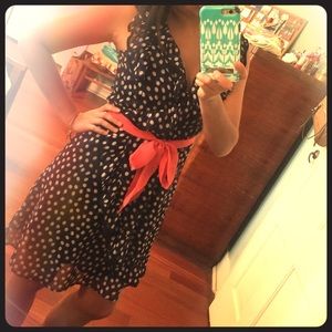Polka dot dress with coral sash