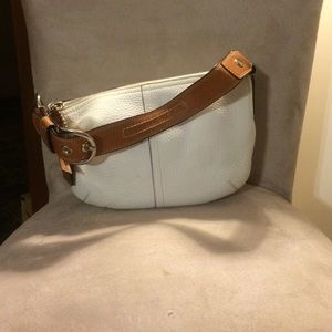 White small coach bag.