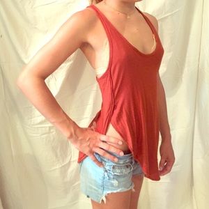 We the Free orange racerback side slit tank