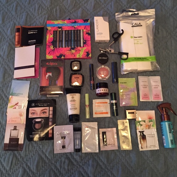 Large lot of makeup and perfume samples.