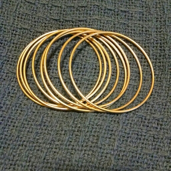 Gold bangles, total 8