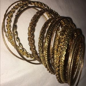 Multiple Gold Bracelets
