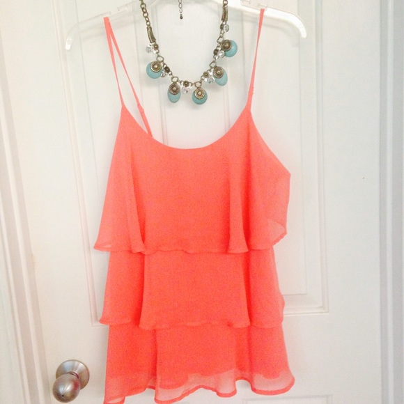 Ruffled layered sleeveless blouse