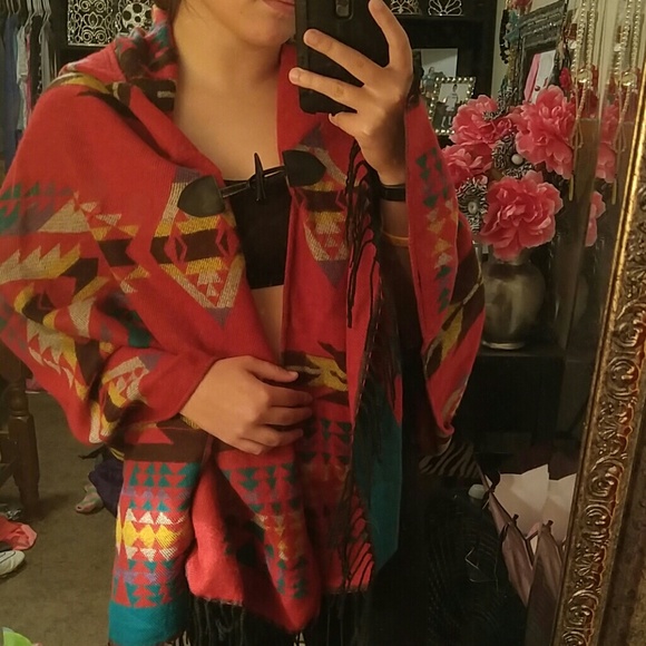 Hooded pancho in tribal print.