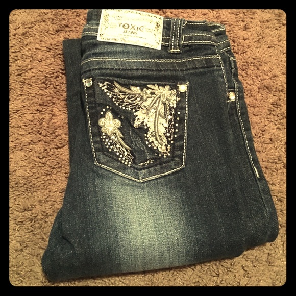 Jeweled and stick detailed boot cut jeans