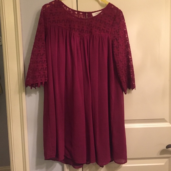 Red flowy dress with flower detail