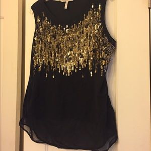 Black sleeveless blouse with gold sequence