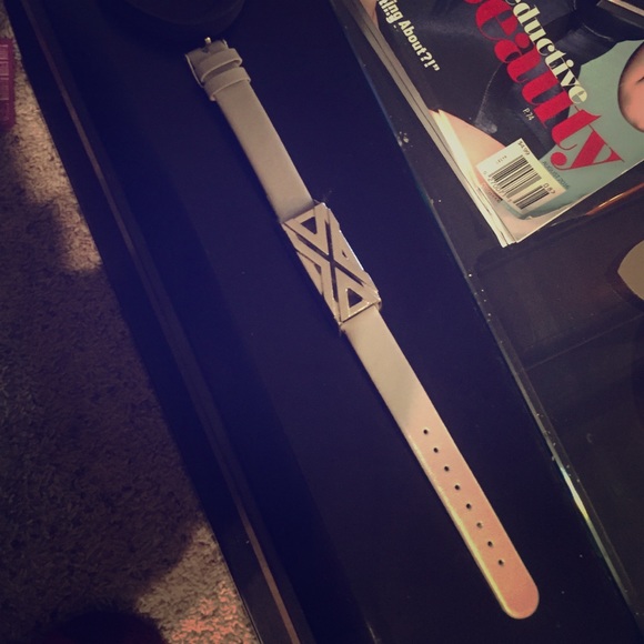 Grey and silver Fitbit Flex bracelet