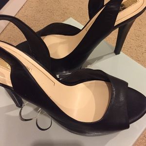 Jessica Simpson open black heels.