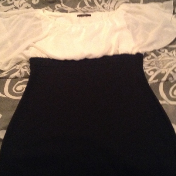 Cream and black form fitting dress