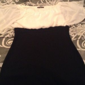 Cream and black form fitting dress