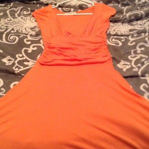 Coral dress with cinched in waist