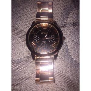 Quartz rose gold watch