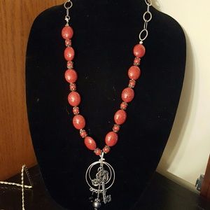 A red handcrafted necklace