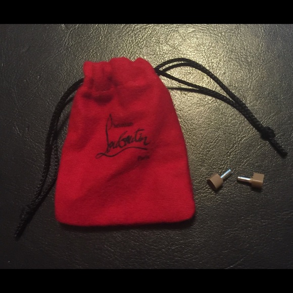 Christian Louboutin heel taps NUDE