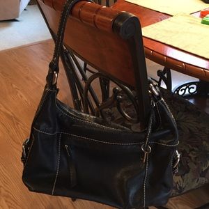 Fossil satchel with chrome hardware.