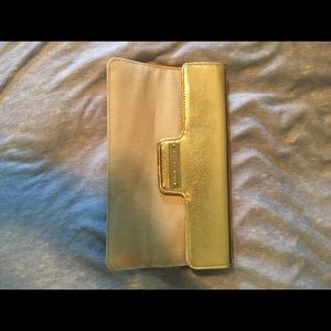 Michael Kors slim gold clutch