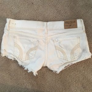 White ripped hollister shorts