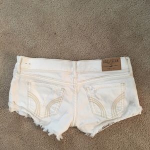 Hollister white ripped shorts